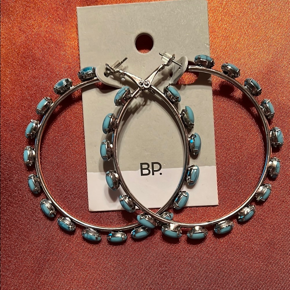 bp Silver and Blue Hoop Earrings
